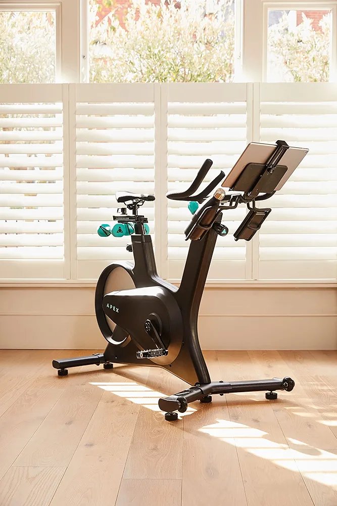 2025/07/815v3CNdr6L._UF8942C1000_QL80_FMwebp_.jpg Apex Rides Smart Bike – App-Connected Indoor Cycling with Real-Time Metrics, Resistance Control & Dumbbell Holder – Home Gym Ready